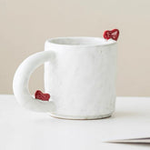 Minimalist Ceramic Mug with 3D Red Hearts
