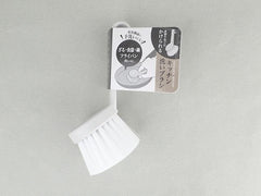 Kitchen washing brush that can be hung on a drainer