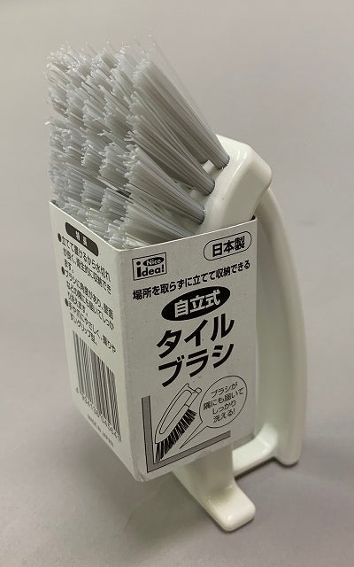 Freestanding tile brush