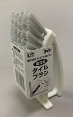 Freestanding tile brush