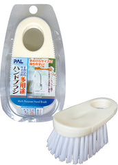 Palm-sized multi-purpose hand brush
